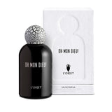 black bell shaped glass bottle with round crackle top in front of a white paper matte packaging box