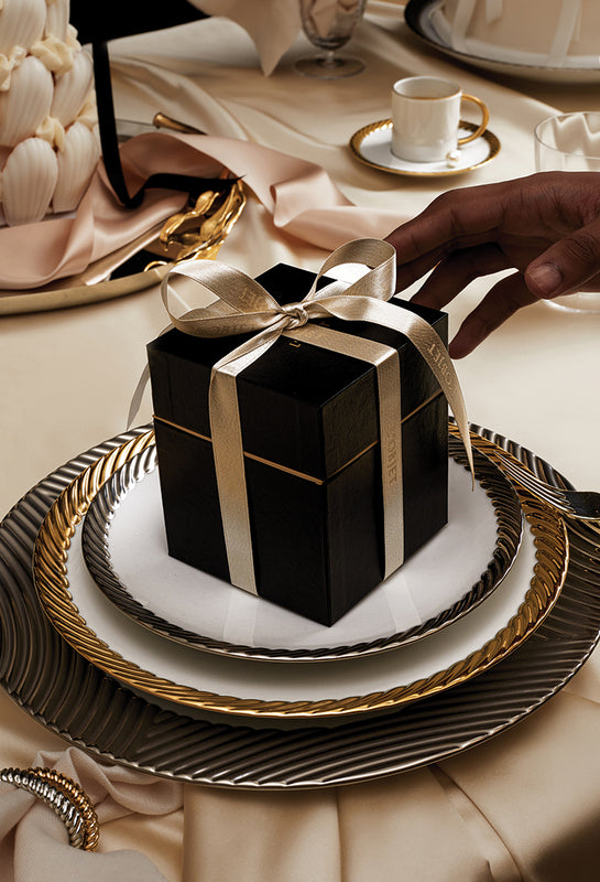 Luxury Gift Box with White Ribbon in a lush elegant holiday table setting