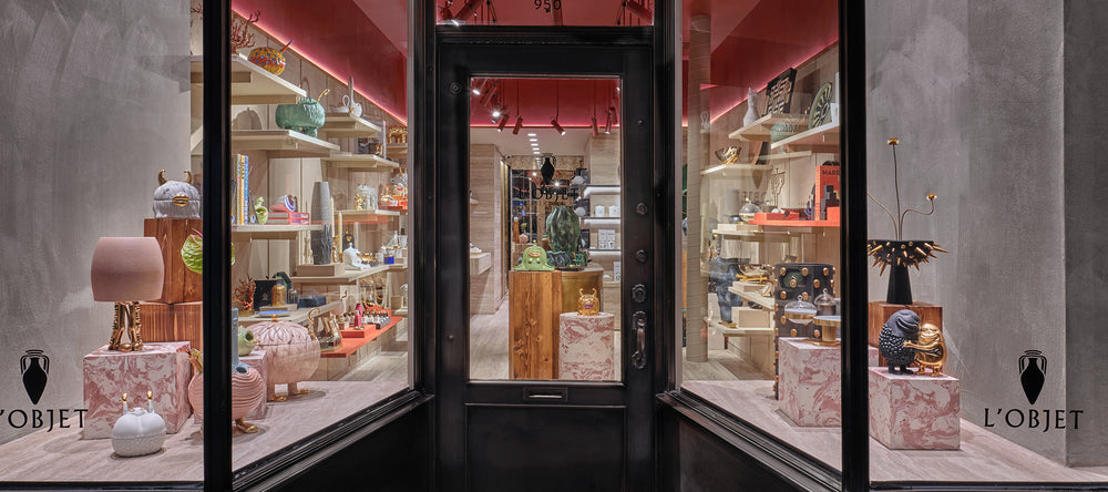 Discover L'OBJET Madison Avenue. Located in New York City. Image of exterior of store with decor items arranged throughout the store in pink and beige hues.