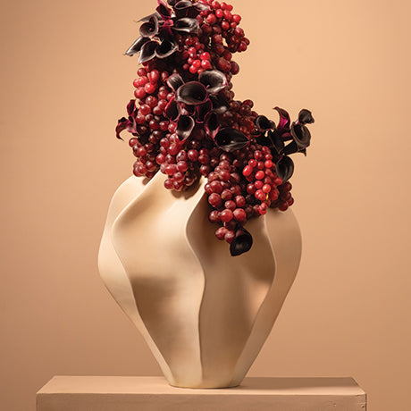 Organic Shaped White Vase with Grapes and Floral Arrangement