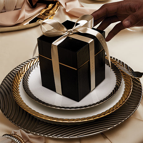 Black Box with White Ribbon on Elegant Holiday Tablescape