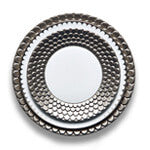 Aegean platinum charger plate with wave motif border, Aegean Filet dinner plate with platinum scalloped border.