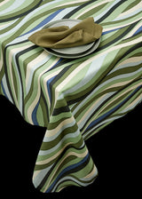 Linen rectangular tablecloth  with an organic, undulating pattern in blue, green and ivory hues.