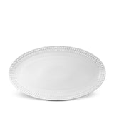 Large Perlée Oval Platter in White - Timeless and Sophisticated Dinnerware Crafted from Limoges Porcelain